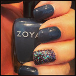 Zoya nail polish in grey with silver glitter.