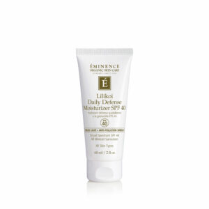 A tube of Eminence Organics Lilikoi Daily Defense Moisturizer SPF 40 2oz on a white background.